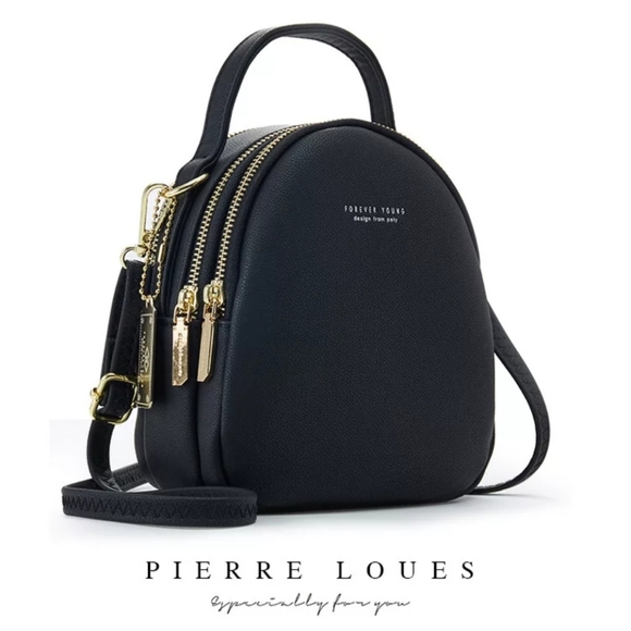 Pierre Loues Handbags - SOLD !!! PIERRE LOUES MINI BLACK BACKPACK